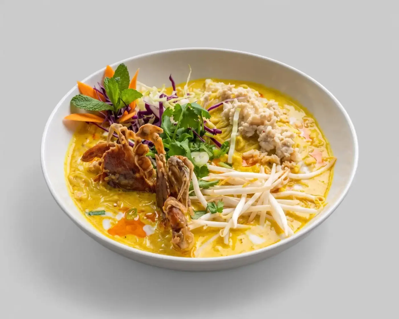 Crab Curry Noodles with soft-shell crab, crab meat and herbs at Sweet Rice